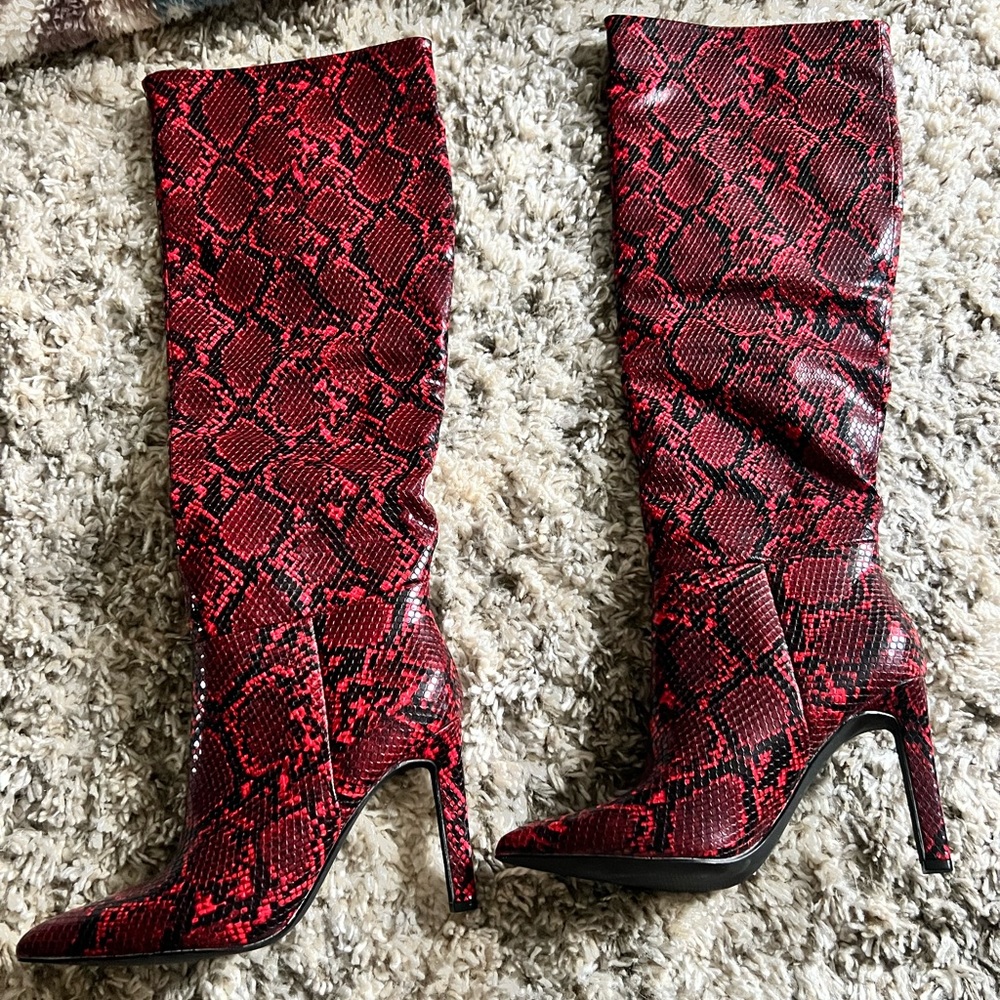 Knee high snake skin heels